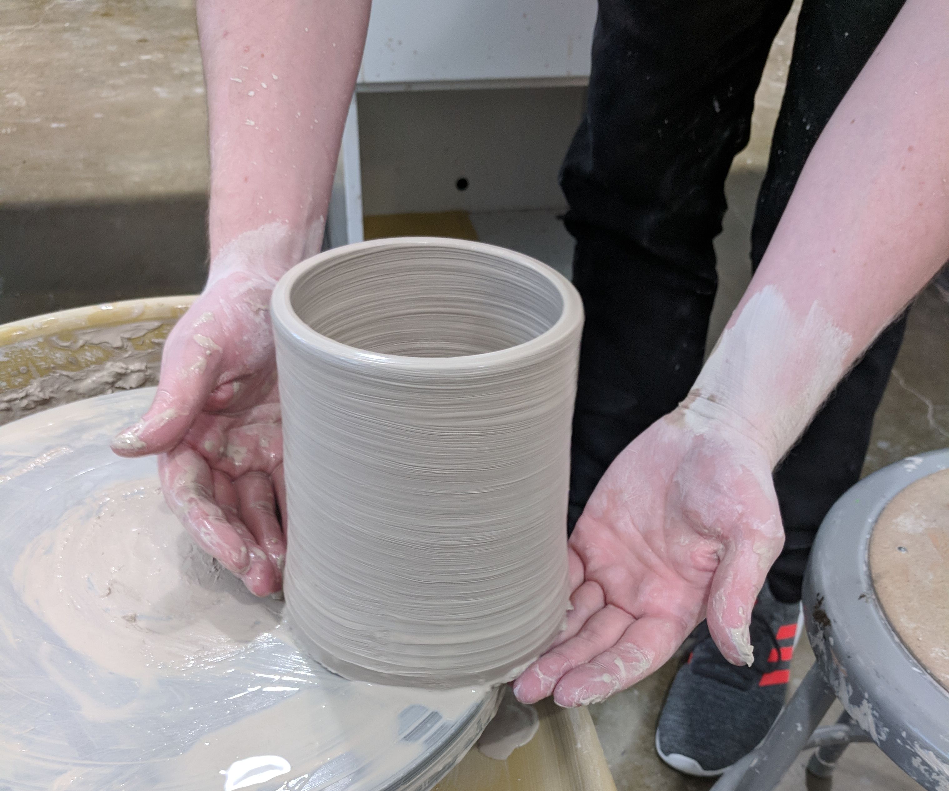 Throwing a Clay Cylinder on the Potters Wheel