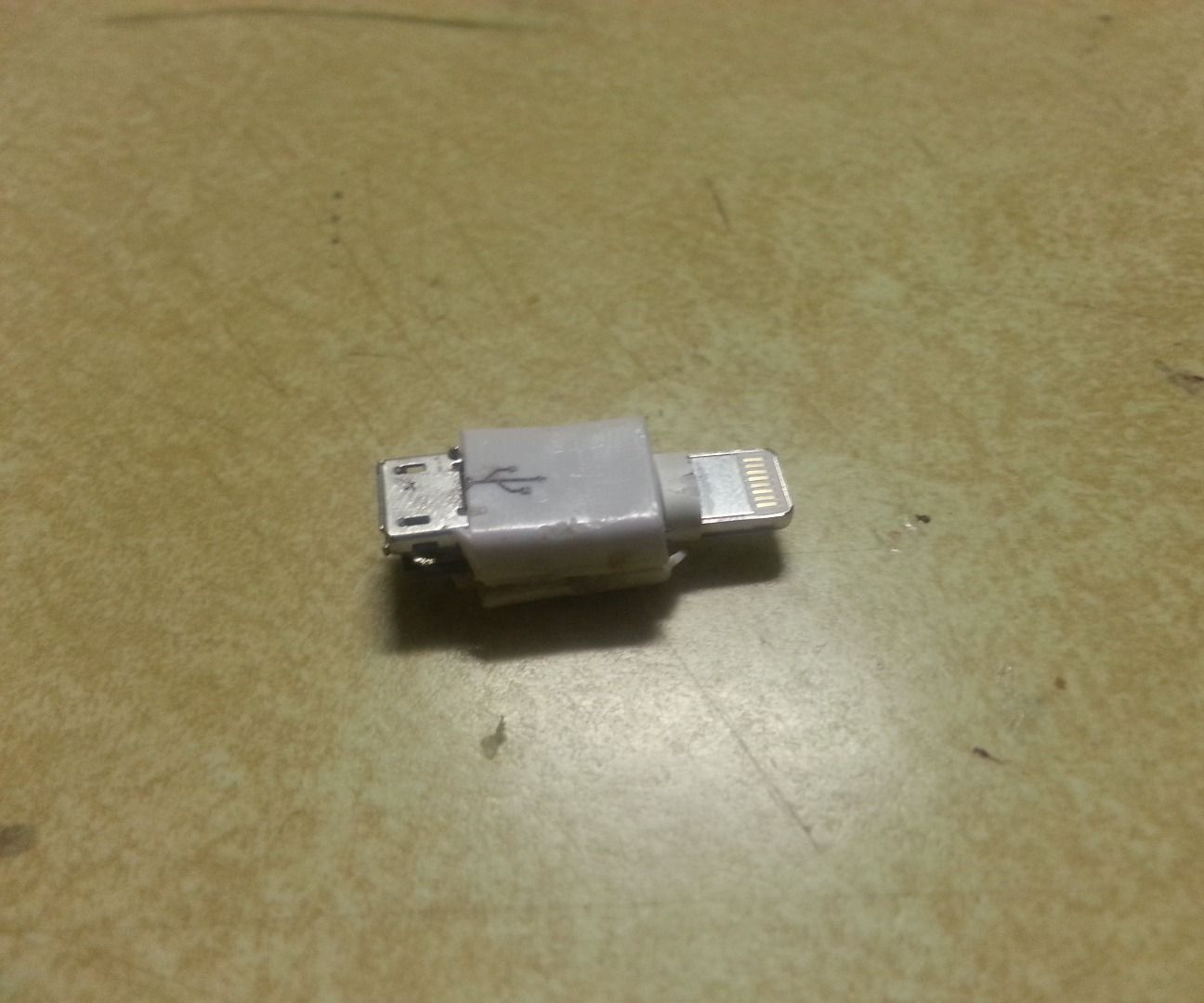 DIY micro USB to lightning cable adapter