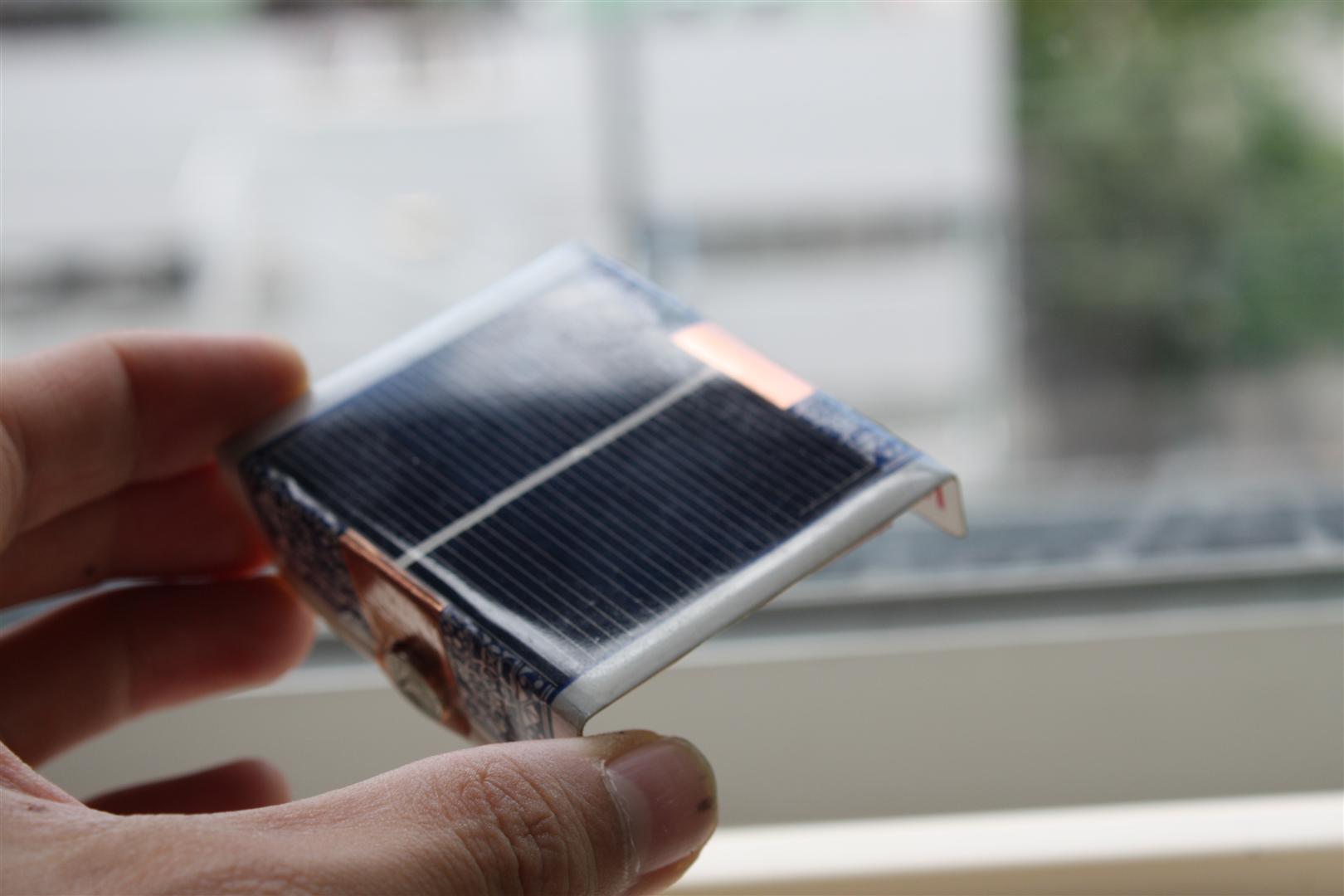 Turn a playing card into a solar charger for AA batteries
