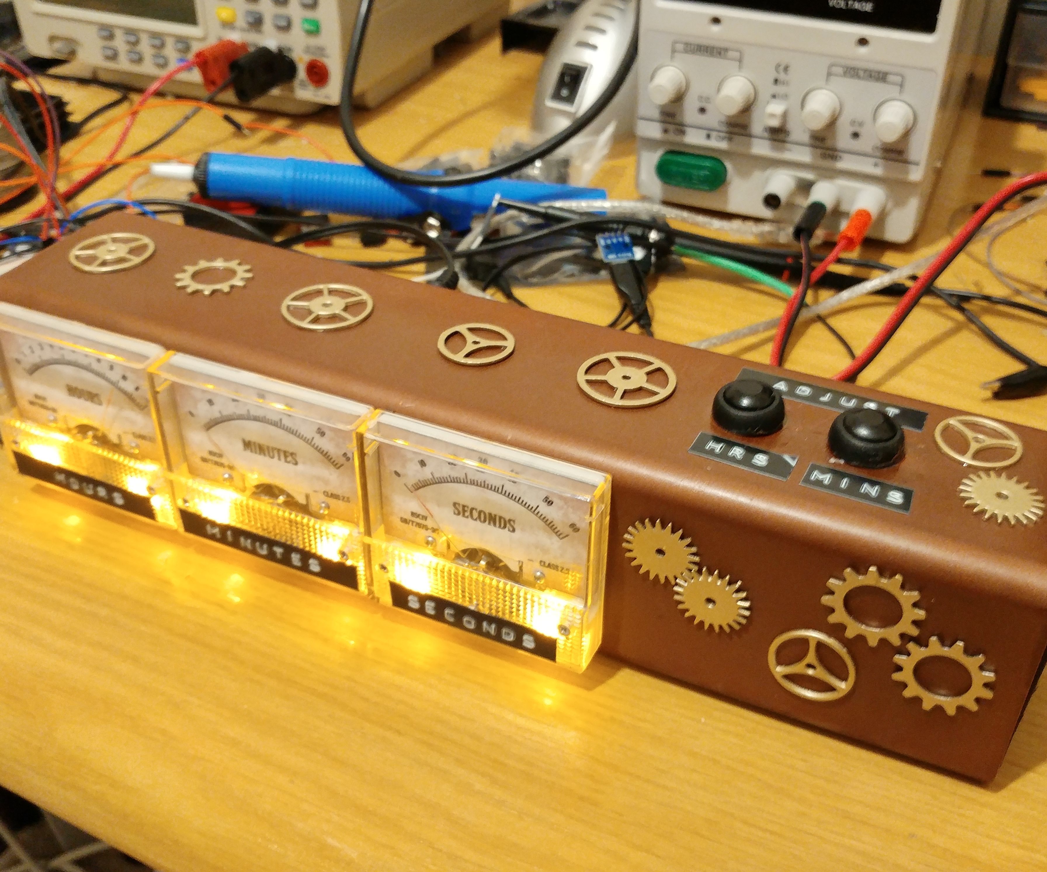 Steampunk voltmeter clock