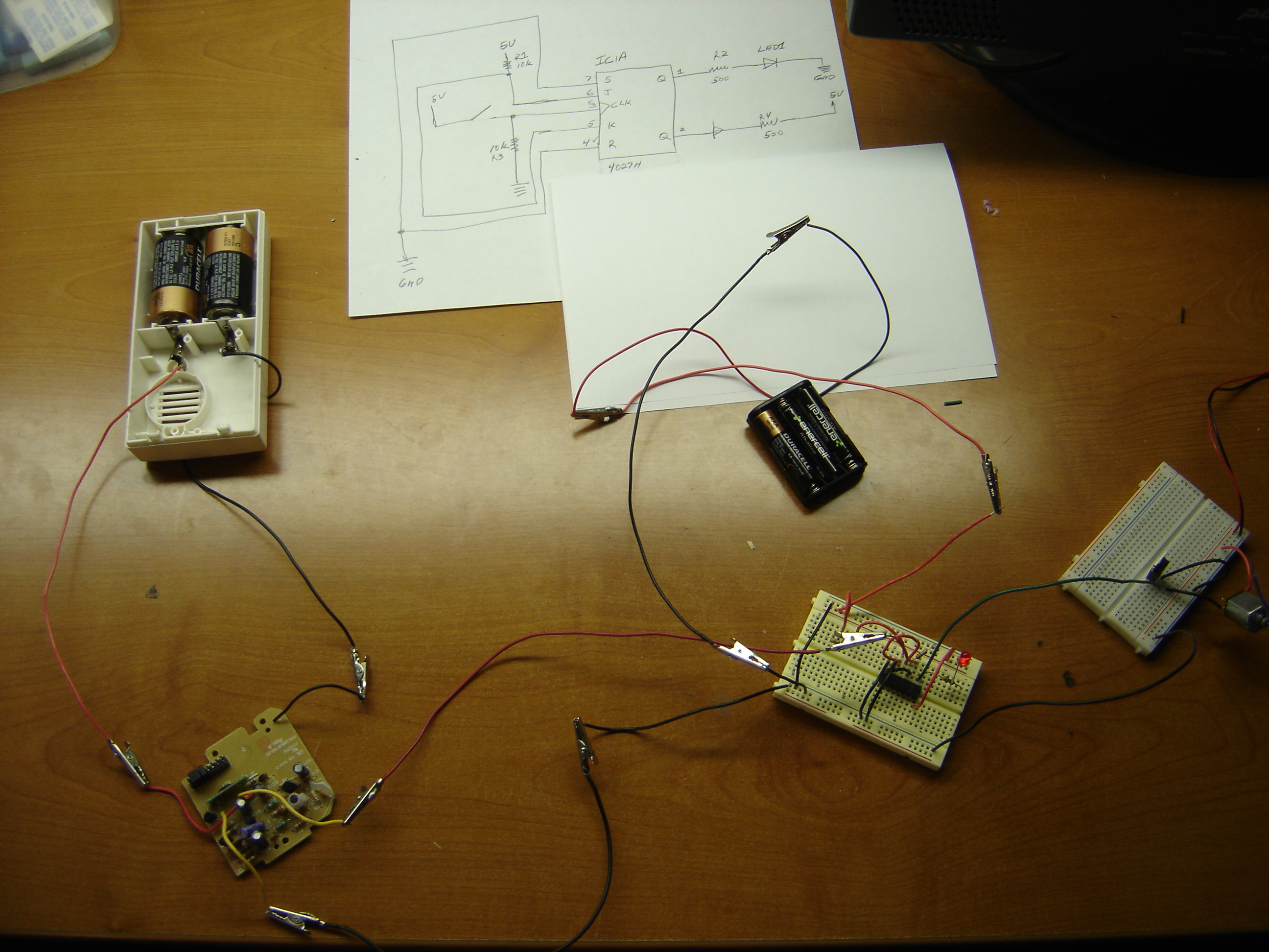 Using a wireless doorbell to turn on a small DC motor.