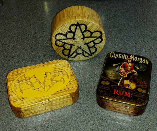 Matchwork tins and boxes.