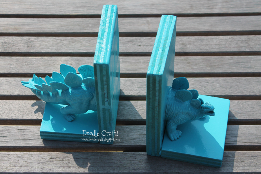 dinosaur toy book ends diy make your own teal aqua spray painted kids toys crafts activities projects t-rex stegosaurus toys plastic and wood upcycle (7).JPG