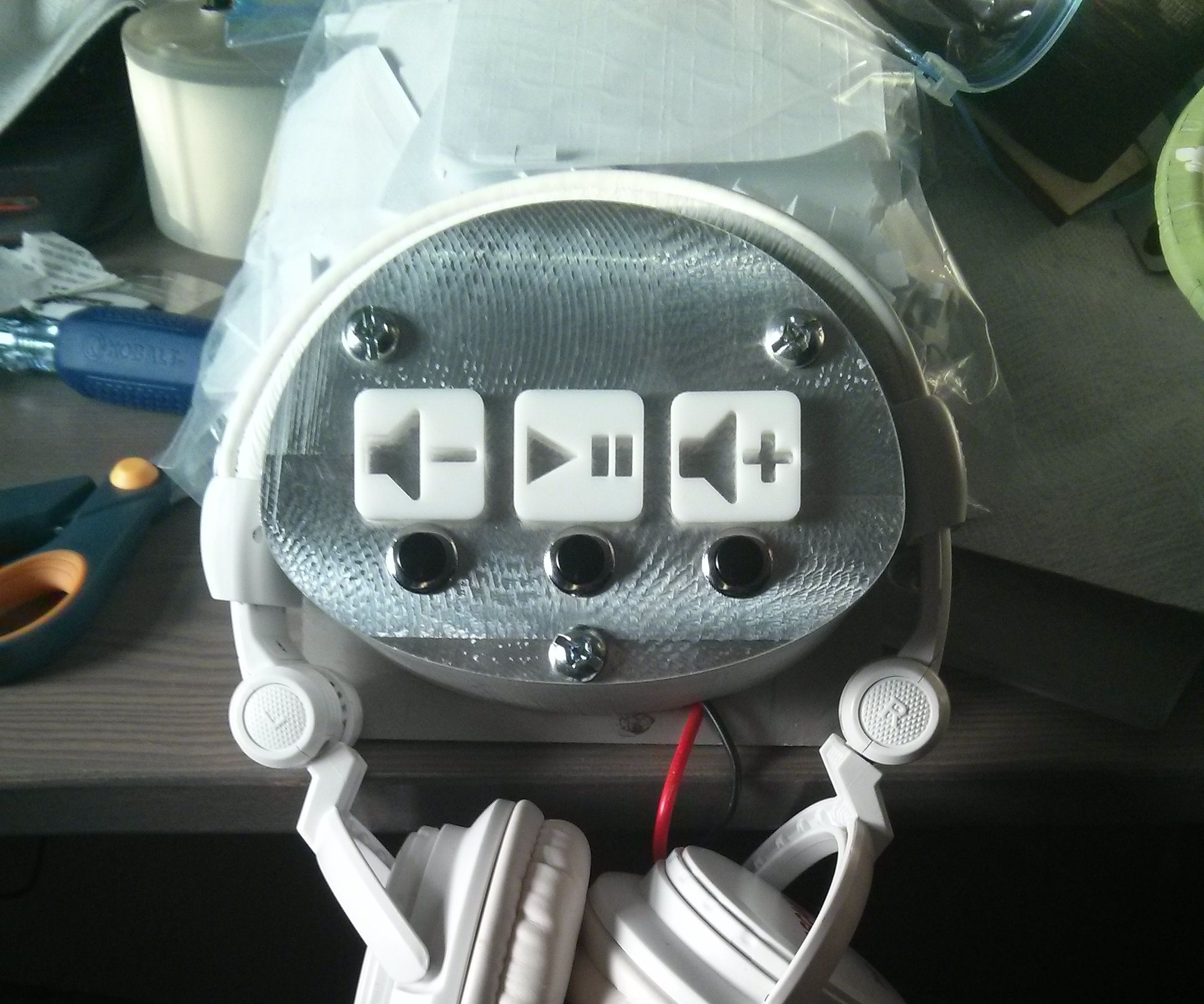 Headphone and MP3 Player Holder for Exhibiting Sound Art