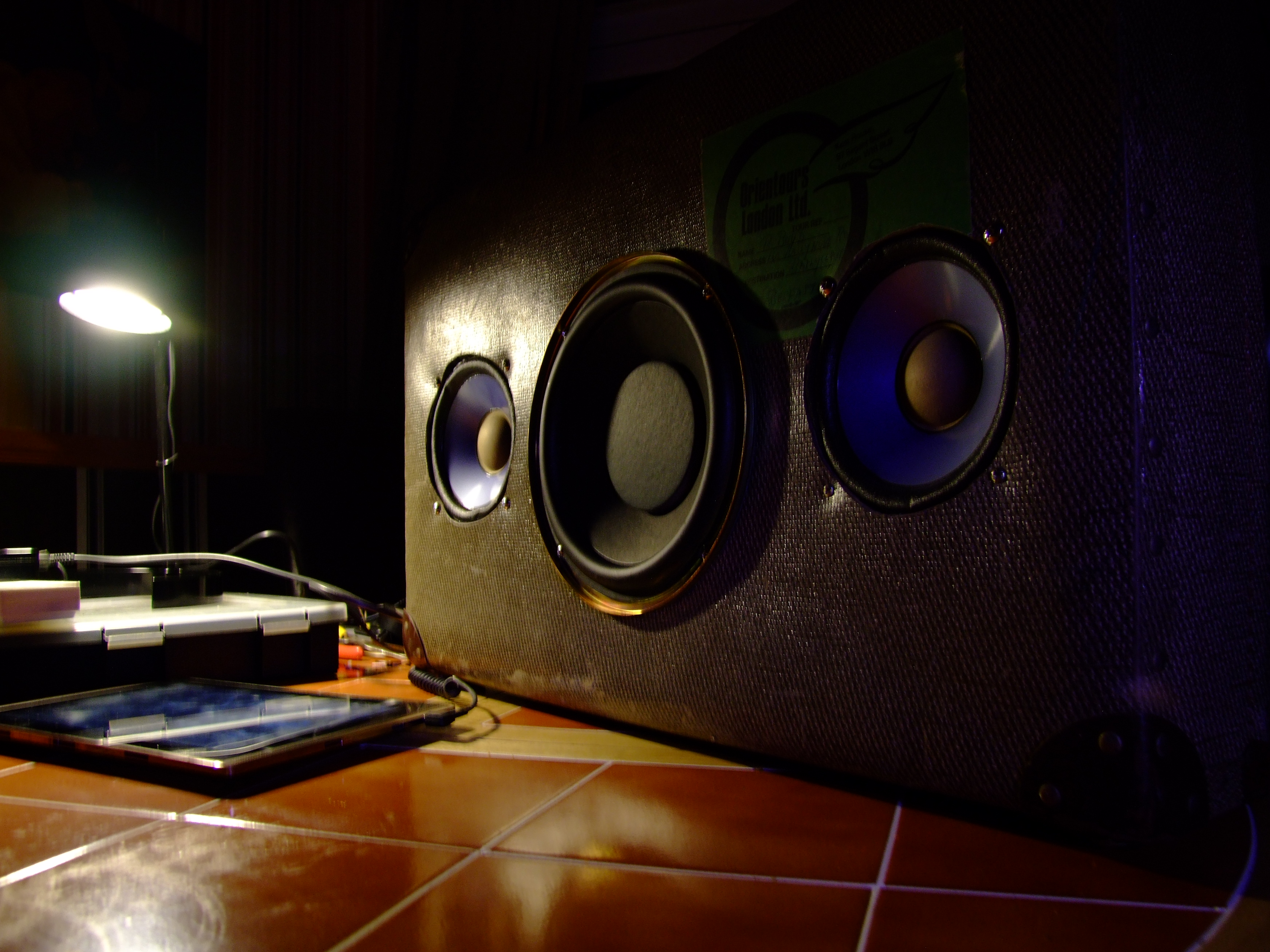 Old suitcase transformed into amplified stereo speaker