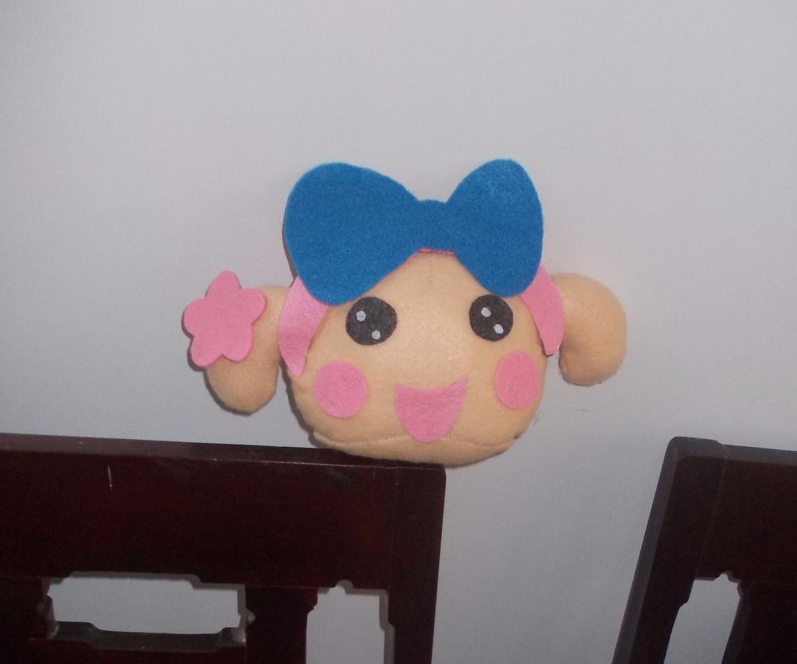 Miss La Sen felt plush head.