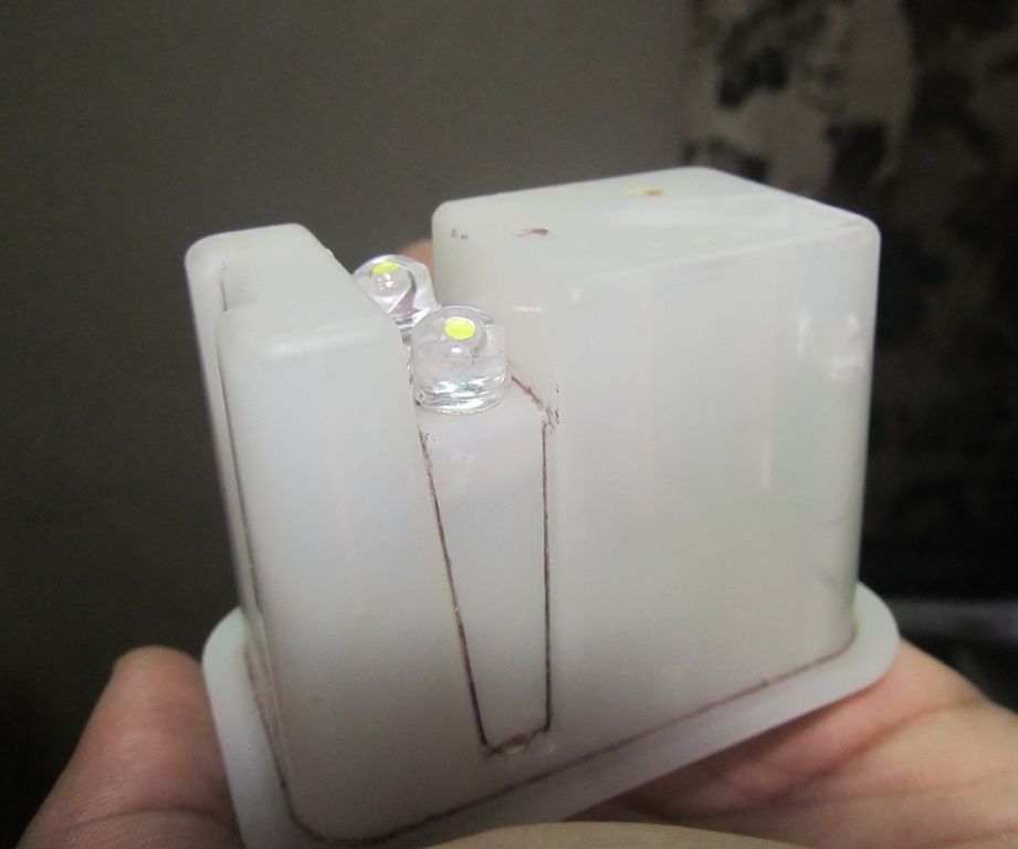 Tiny cheap charge light out of junk 