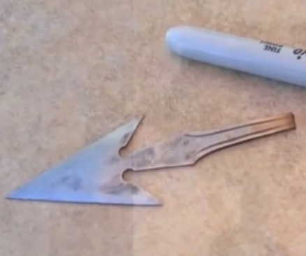 HOW TO MAKE AN ARROWHEAD OUT OF A SPOON!!!